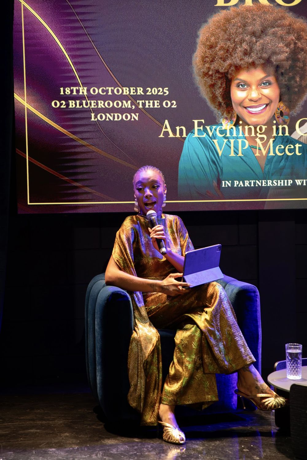 Paige on stage at An Evening in Conversation, O2 Blueroom